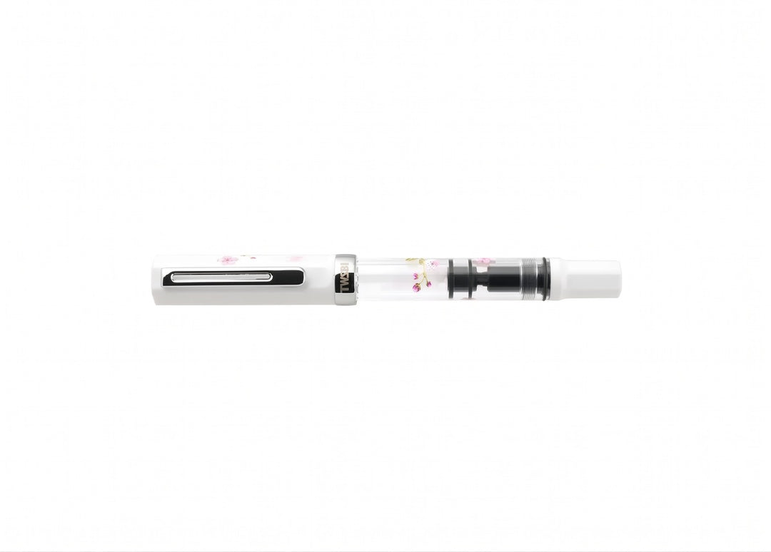 Horizontal profile view of the capped TWSBI ECO Cherry Blossom fountain pen, featuring silver trim, a clear printed barrel, and white accents.