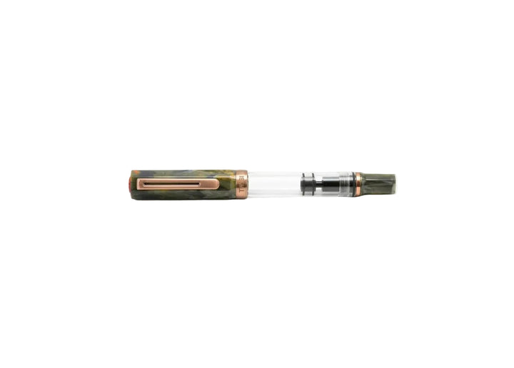 Perfectly horizontal profile of the capped TWSBI ECO Serpentine Bronze fountain pen centered on a pure white background. The clean composition emphasizes the clear demonstrator barrel, the earthy swirled olive green and grey marble resin cap and blind cap, and the rich bronze-plated pocket clip and trim ring.