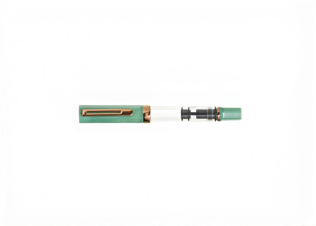 Capped TWSBI ECO Jade Jelly Bronze fountain pen, horizontal side profile view showing the bronze cap band and internal piston mechanism on a pure white background.