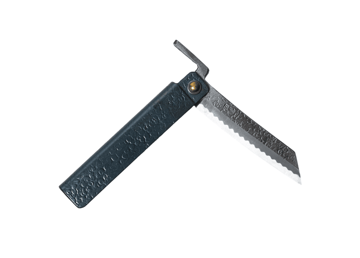 Partially open Tomita Higo knife featuring a black tsuchime hammered iron handle and a traditional profile Shirogami steel blade with Midareba pattern.
