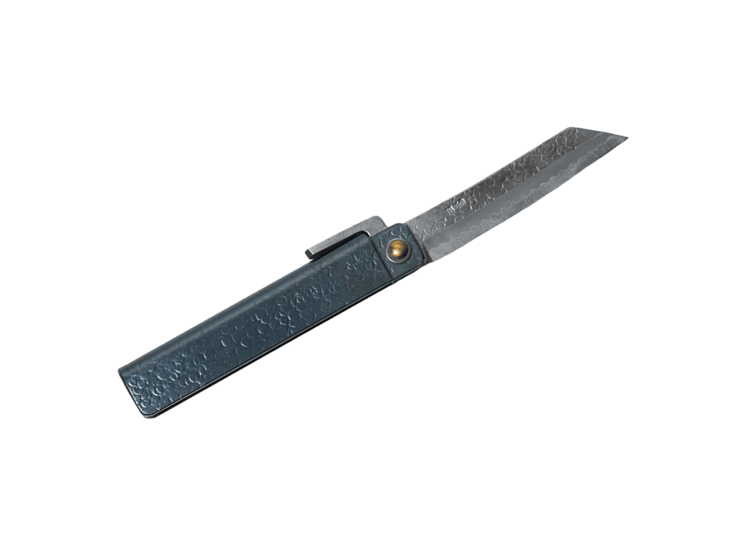 Fully open large Tomita Higo knife displaying the Shirogami #2 steel traditional blade, black tsuchime handle, and signature Midareba wave pattern.