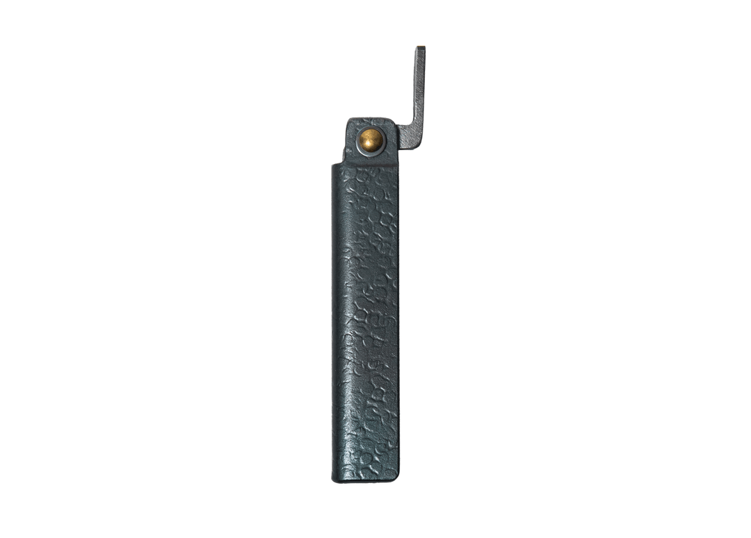 Closed Tomita White Steel Higo knife showcasing the textured black tsuchime iron handle and traditional chikiri lever.