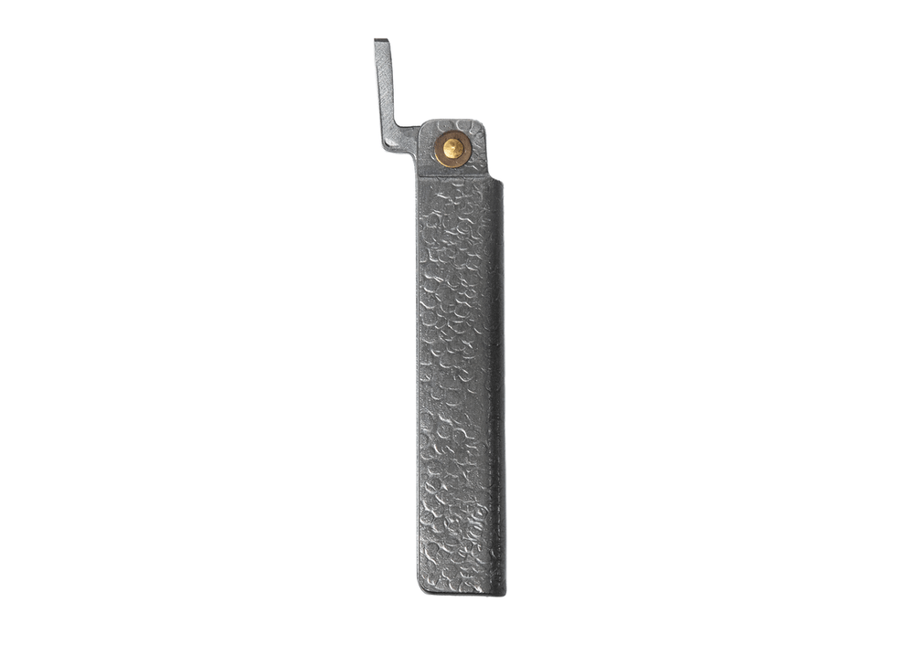 Closed large Tomita White Steel Higo knife showcasing the textured silver tsuchime iron handle and traditional chikiri lever.
