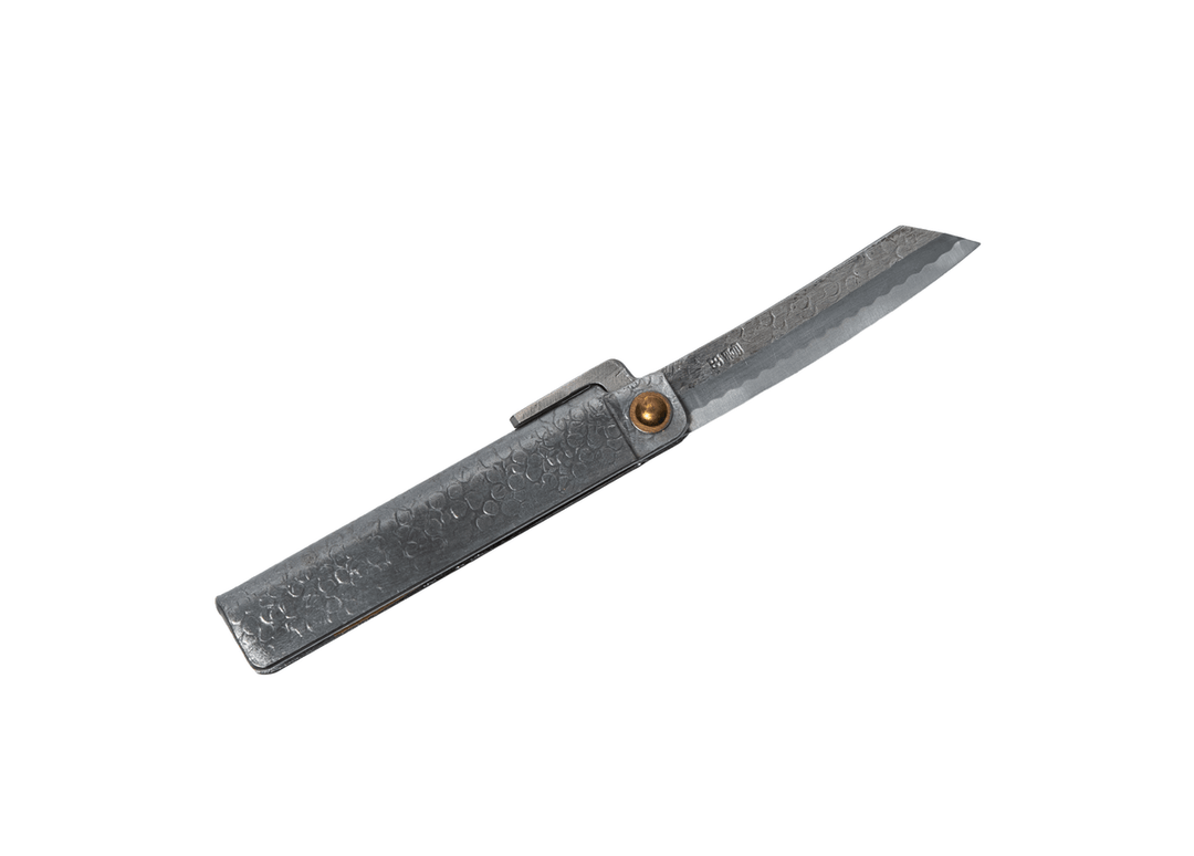 Fully open Tomita Higo knife displaying the Shirogami #2 steel traditional blade, silver tsuchime handle, and signature Midareba wave pattern.