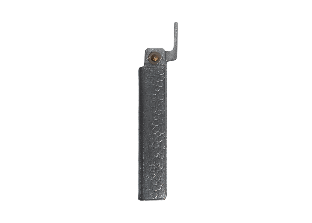 Closed Tomita White Steel Higo knife showcasing the textured silver tsuchime iron handle and traditional chikiri lever.