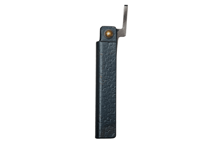Closed Tomita White Steel Kengata Higo knife showcasing the textured black tsuchime iron handle and traditional chikiri lever.