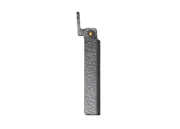 Profile view of the closed Tomita Higo friction folder, highlighting the hand-forged silver hammered iron handle and brass pivot.