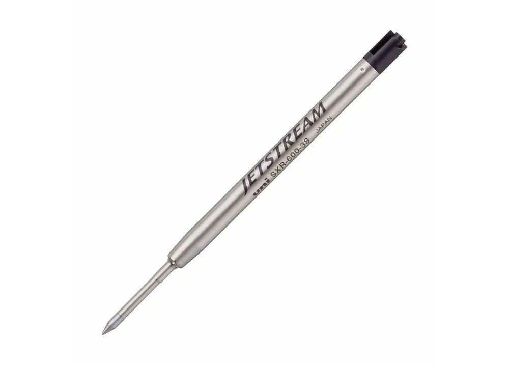 Close-up of a single metal Uni Jetstream SXR-600 G2 ballpoint pen refill showing the precision writing tip, engraved branding, and standard black ink end cap.