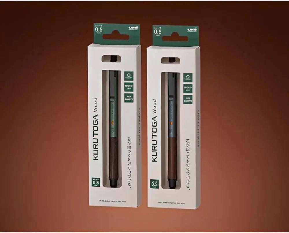 Official Japanese retail packaging for the Uni Kuru Toga Wood 0.5mm mechanical pencils in Forest Green and Steel Gray.