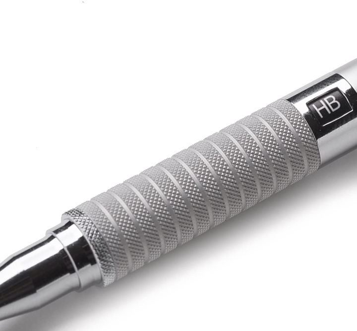 Macro shot of Staedtler 925 25 diamond-cut knurled grip and adjustable lead hardness indicator. High-rigidity aluminum construction for non-slip control.