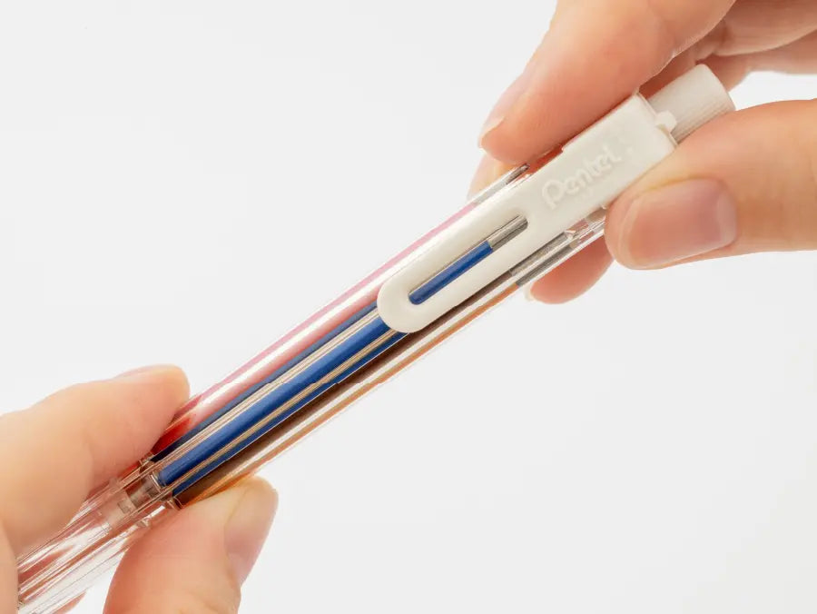 Close up of Pentel Multi 8 gravity-select clutch mechanism and transparent barrel showing 8 internal lead chambers.