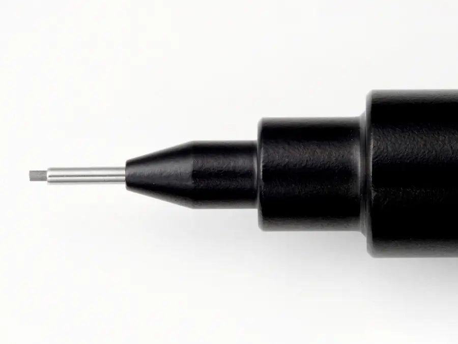 Step-head tapered tip design of Pentel Graph 1000 for maximum visibility of the paper and straightedge.
