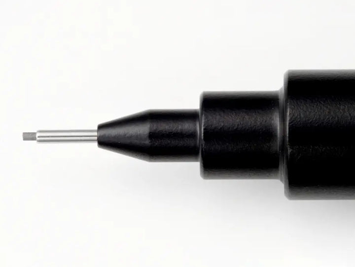 Step-head tapered tip design of Pentel Graph 1000 for maximum visibility of the paper and straightedge.