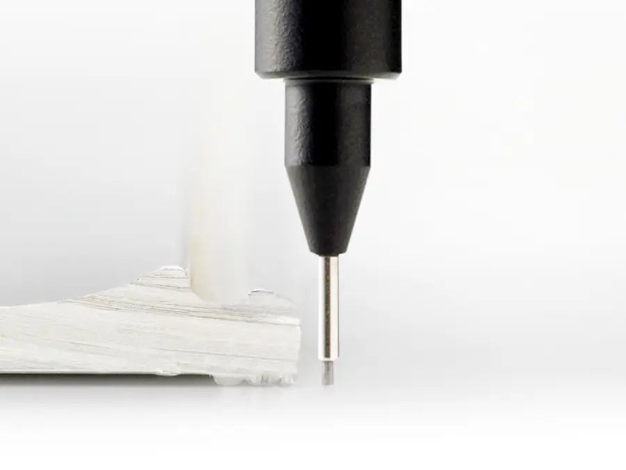 Non-reflective matte black tip of Pentel Graph 1000 For Pro designed to eliminate glare during precision drafting.