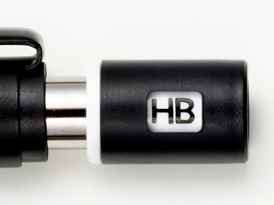 Adjustable lead grade indicator window on Pentel Graph 1000 for tracking lead hardness from 3H to B.