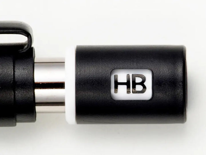 Adjustable lead grade indicator window on Pentel Graph 1000 for tracking lead hardness from 3H to B.