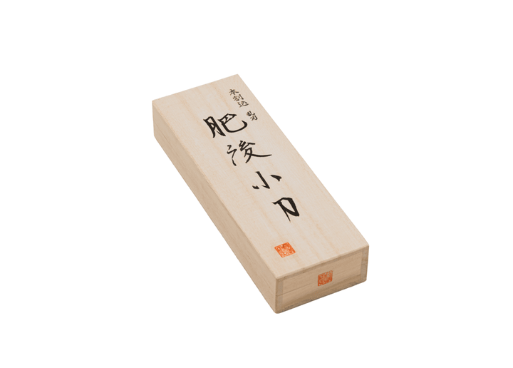 Traditional wooden presentation box for the Tomita Higo knife, featuring Japanese calligraphy denoting the Midareba forging and red artisan seals.