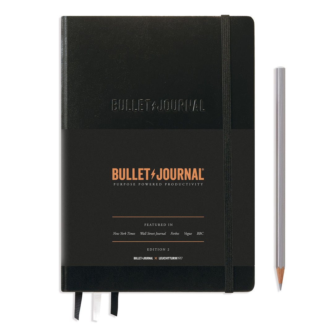 https://penandtool.com/cdn/shop/products/bullet-journal-edition-2-medium-a5-hardcover-206-numbered-pages-black-dotted.jpg?v=1680664339&width=1080
